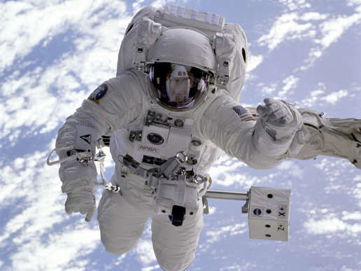 Astronaut Michael Gernhardt floats aove the Earth