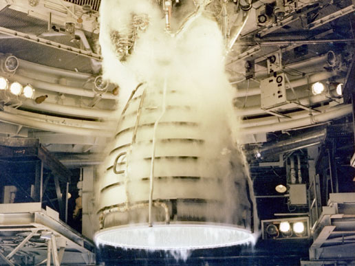 Space shuttle main engine undergoes a test firing.