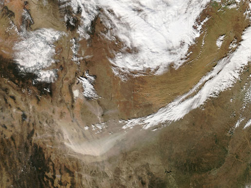 Swirling dust clouds over Texas and Mexico