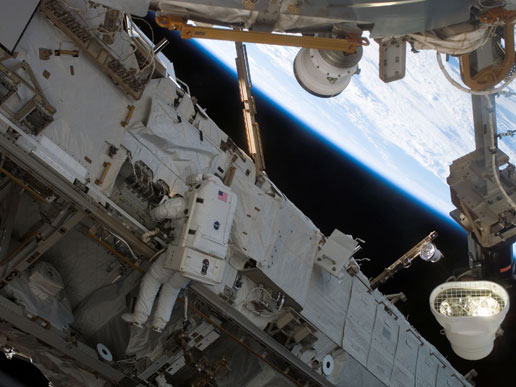 Astronaut Michael E. Fossum, an STS-121 mission specialist, participates in the mission's second extravehicular activity.