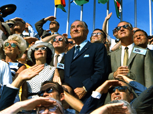 Vice President Spiro Agnew and former President Lyndon B. Johnson view the liftoff of Apollo 11.