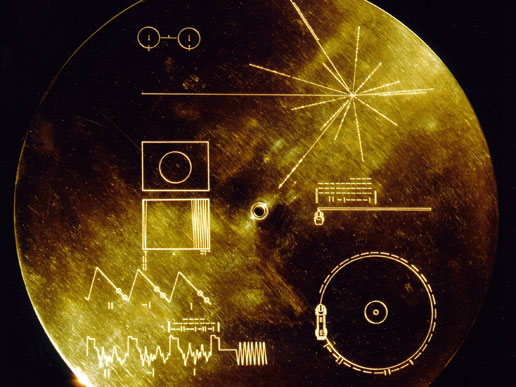 Gold aluminum cover designed to protect the Voyager 1 and 2 Sounds of Earth gold-plated records from micrometeorite bombardment